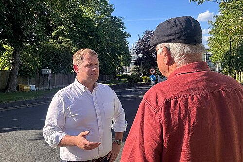 Luke Taylor listening to local people. 